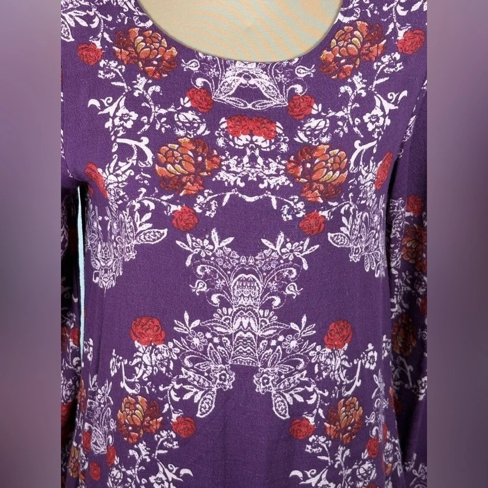 Free People Smooth Talker Purple Floral Open Back Long Sleeved Ruffled Tunic Top